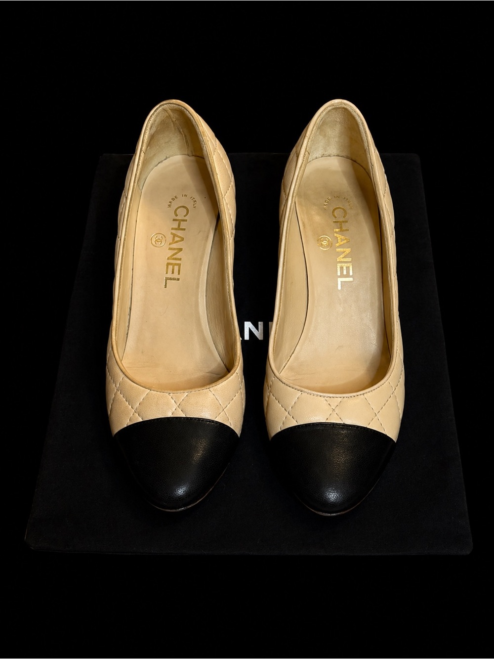 CHANEL Quilted Cap Toe CC Pumps in Beige & Black Leather - Picture 11 of 14